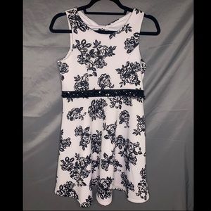 White with black floral pattern. Size 14.